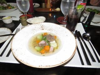 Soup in white bowl on dinner table in Costa Rica