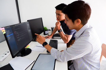 Cropped shot view Programmers working in company. Developing software, programming, Website design and coding technologies.