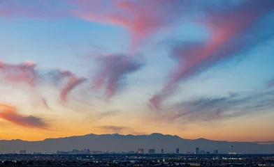 Foto op Canvas Sunset aerial view of the strip with mountain behind © Kit Leong