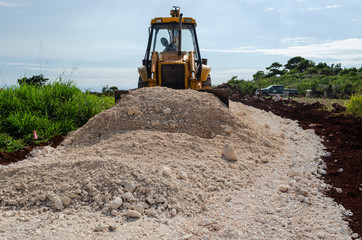 Equipment At Work Spreading Marl