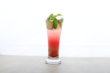 mojito cocktail juice in glass isolated white rum, lime juice, soda water, and mint. Its combination of sweetness, citrus, and herbaceous mint flavors is intended to complement the rum, summer drink