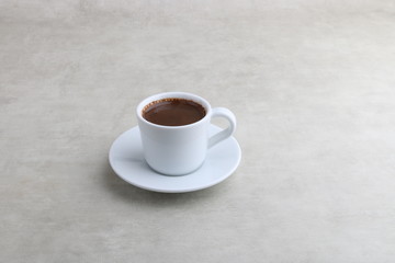 Turkish Coffee Cup - Coffee in a white cup isolated on a white background - with copy space fot text