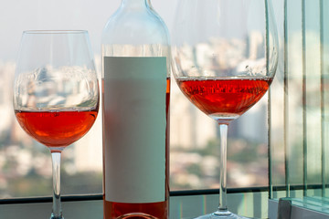 Refreshing pink rose wine in a glass. Space to write.