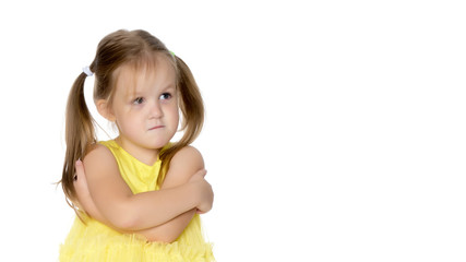 Sad little girl.Isolated on a white background.