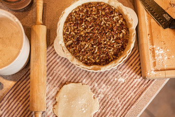 Baking a fresh homemade pecan pie for the Holidays