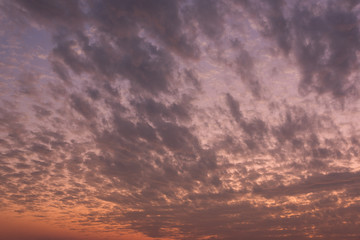 Naklejka na ściany i meble Dramatic landscape with beautiful evening clouds