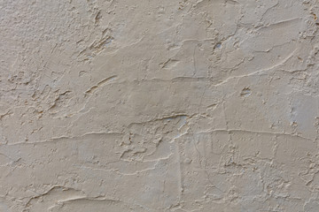YELLOW PAINT WALL WITH CEMENT ROUGH SURFACE, BACKGROUND
