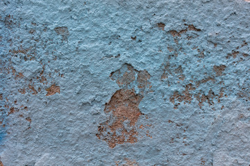 BLUE PAINT WALL WITH CEMENT ROUGH SURFACE, BACKGROUND