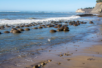 Massive rock outcropping at Bowling ball beach california .