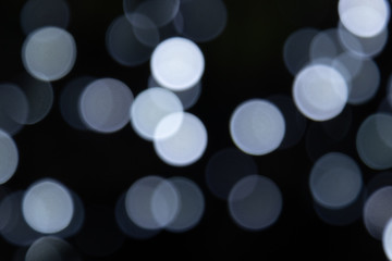 Background with many multi-colored bokeh lights