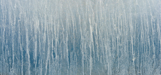Ice background. The frozen texture of the water