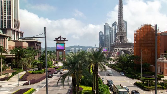 Cotai Macau street traffic cityscape day timelapse pan up