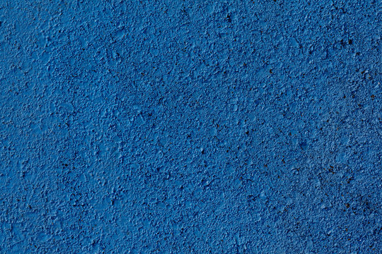 asfalt painted in blue for handicapped
