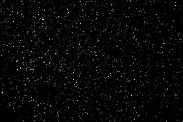 Chaotic white star bokeh on a isolated black background. falling blurry bokeh snow overlay, starry sky. white spots on black background, white drops and spots. abstraction.