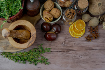 Winter autumn  different ingredients for a warming hot tea  white wood background, copy space, top view