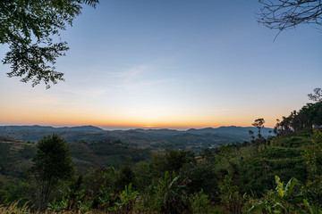 beautiful blue sky high peak mountains mist fog wildlife green forest at Khao Koh Phu Tub Berk Phetchabun Thailand guiding idea long weekend for backpacker camping campfire relaxing hiking  