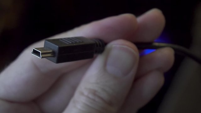 Examining a Black USB Mini-b (5-pin) Cable