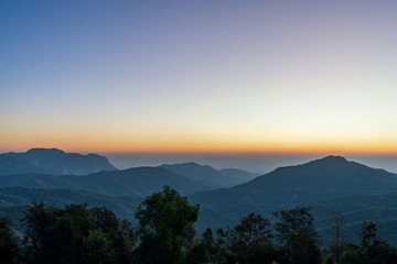 beautiful blue sky high peak mountains mist fog wildlife green forest at Khao Koh Phu Tub Berk Phetchabun Thailand guiding idea long weekend for backpacker camping campfire relaxing hiking  