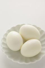 Homemade boiled egg on white plate for food ingredient,