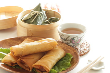 Chinese dumpling, meat and sticky rice wrapped zongzi in bamboo basket