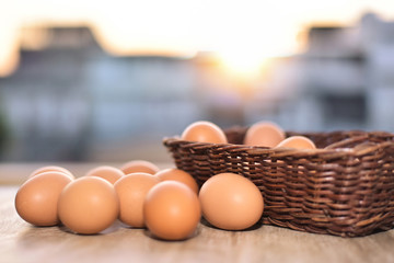 Fresh eggs on the breakfast cooking table with the beam of morning sunrise