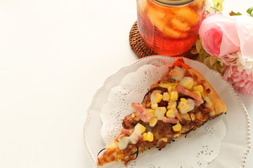 Italian food, piece of bacon and corn pizza on dish