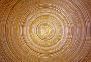 Circular background texture of light wood