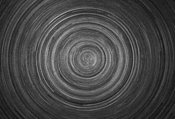 Circular background texture of dark wood