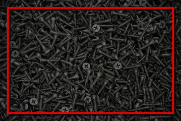 The dark texture of the screws