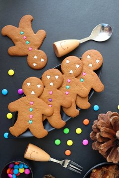 Christmas food. Gingerbread man cookies in Christmas concept settings background. Xmas dessert. background elements. Copy space