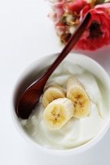 Banana and honey on yogurt for healthy breakfast