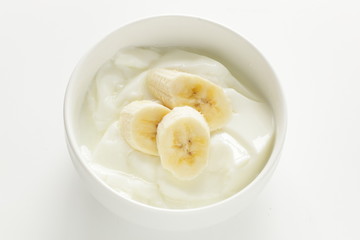 Banana and honey on yogurt for healthy breakfast