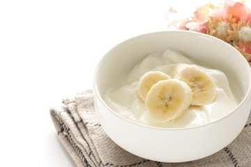 Banana and honey on yogurt for healthy breakfast
