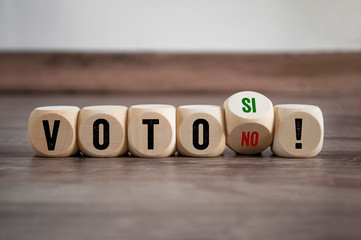 Cubes and dice with the spanish word for vote yes and no - voto si no