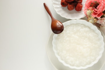 Chinese food, rice porridge in white bowl with copy space for healthy breakfast