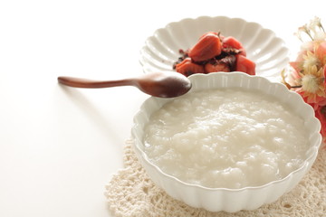 Japanese food, marinated plum Umeboshi and rice porridge