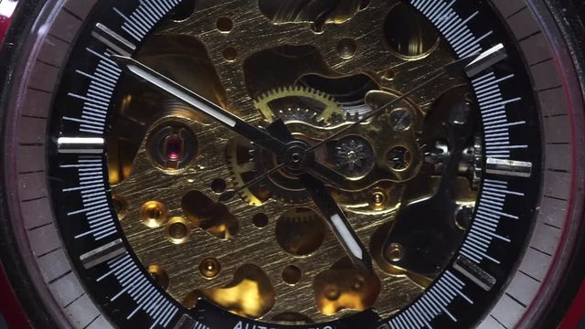 Close-up the watch machinery,Beautiful Watch Gears Spinning and Keeping Time.