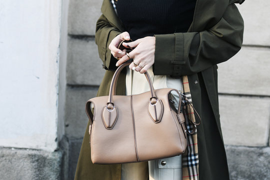 Milan, Italy - February 22, 2019: Street style &ndash; Influencer Xenia Adonts wearing a Burberry coat before a fashion show during Milan Fashion Week - MFWFW19