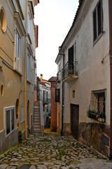 Obraz premium Caiazzo, Italy, 11/12/2019. An alley among the old houses of a medieval village