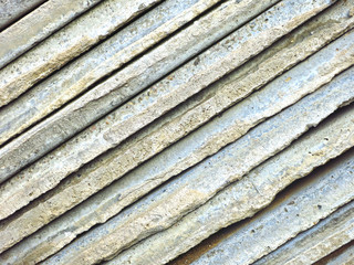  concrete tiles lay in layers on top of each other 