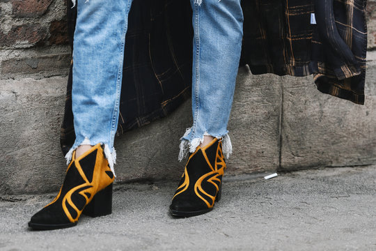 Milan, Italy - February 23, 2019: Street style – Boots detail after a fashion show during Milan Fashion Week - MFWFW19