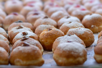 Hanukkah donuts (sufgania) are delicious and sweet in honor of Chanukah (the winter Jewish holiday in memory of miracles and wonders). Filled with strawberry jam or milk jam and deep-fried.