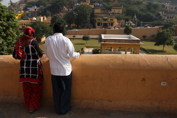 Famous fort Amber Amer in Jaipur. Couple of tourists looking down