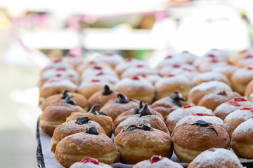 Hanukkah donuts (sufgania) are delicious and sweet in honor of Chanukah (the winter Jewish holiday in memory of miracles and wonders). Filled with strawberry jam or milk jam and deep-fried.