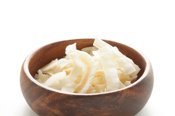 Thai food, dried coconut in wooden bowl