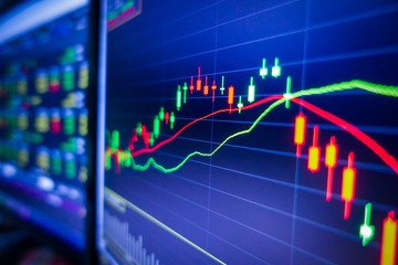 Blue stock exchange market graph on LED screen for business analysis. Finance and economic graphs.