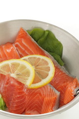 Freshness salmon and lemon on stainless steel pan