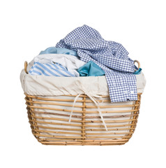 Vintage wicker basket with laundry isolated on white background