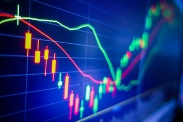Blue stock exchange market graph on LED screen for business analysis. Finance and economic graphs.