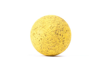 Old and dirty yellow rubber ball Isolated, toy for dogs